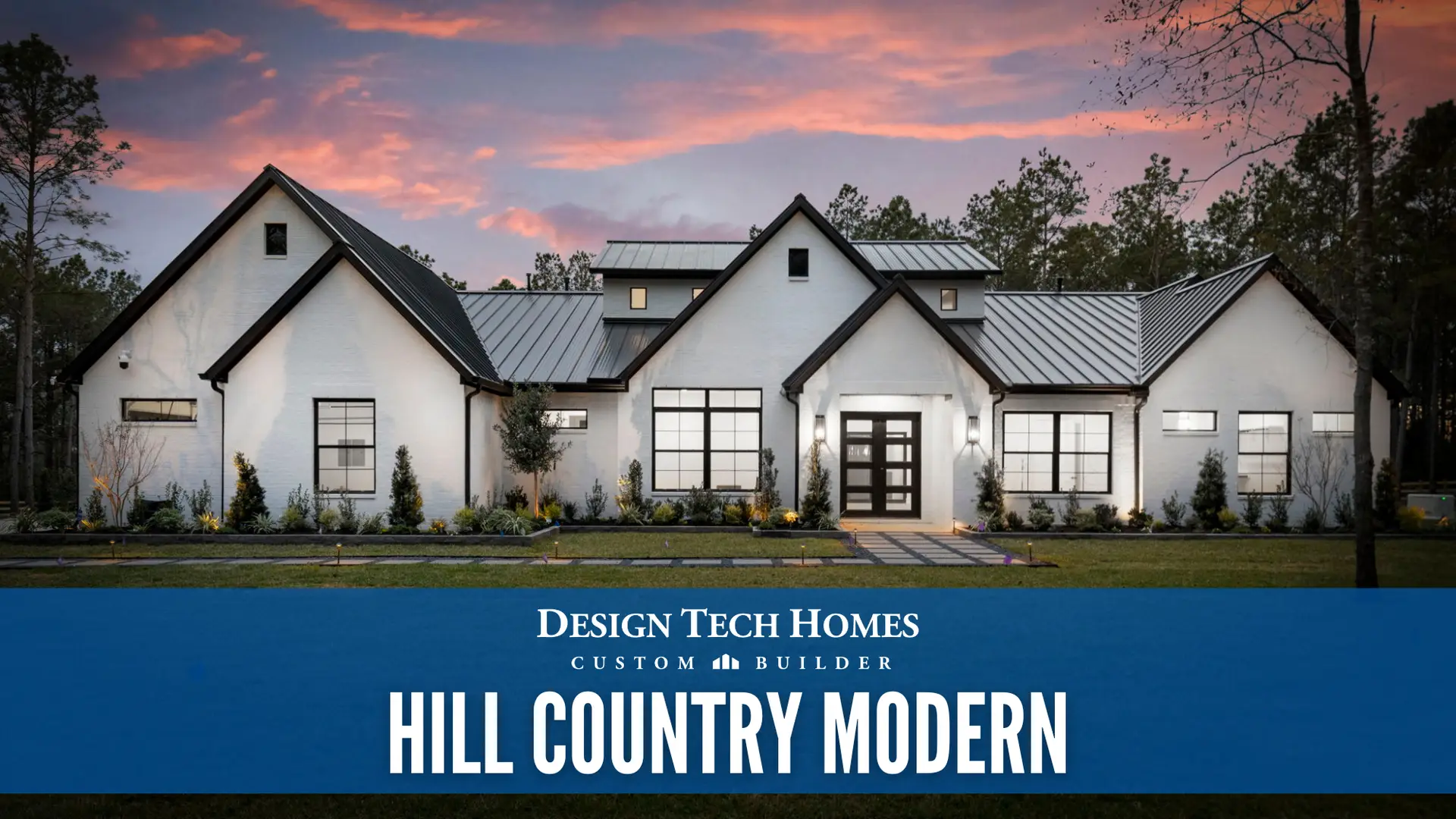 Completed modern Hill Country home with white brick exterior, metal roofs, large windows at sunset