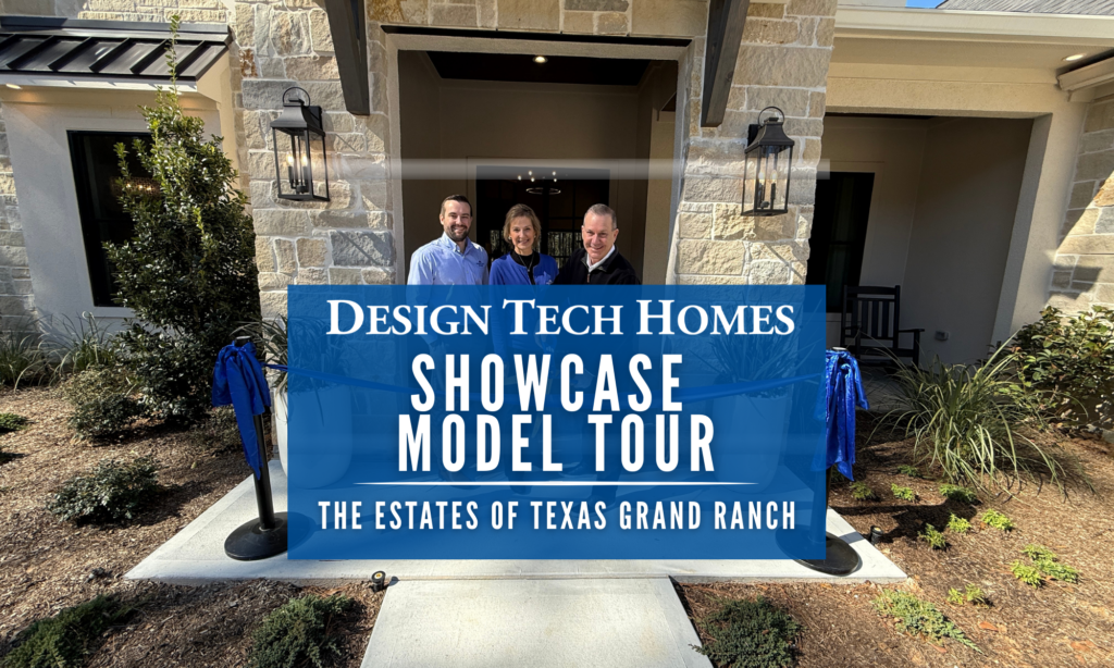 Design Tech Homes showcase model home tour at The Estates of Texas Grand Ranch with Mike, Barbara, and Matt Feigin standing at the front entrance.